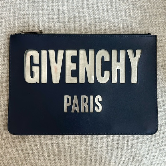 Givenchy Handbags - givenchy iconic print pouch clutch